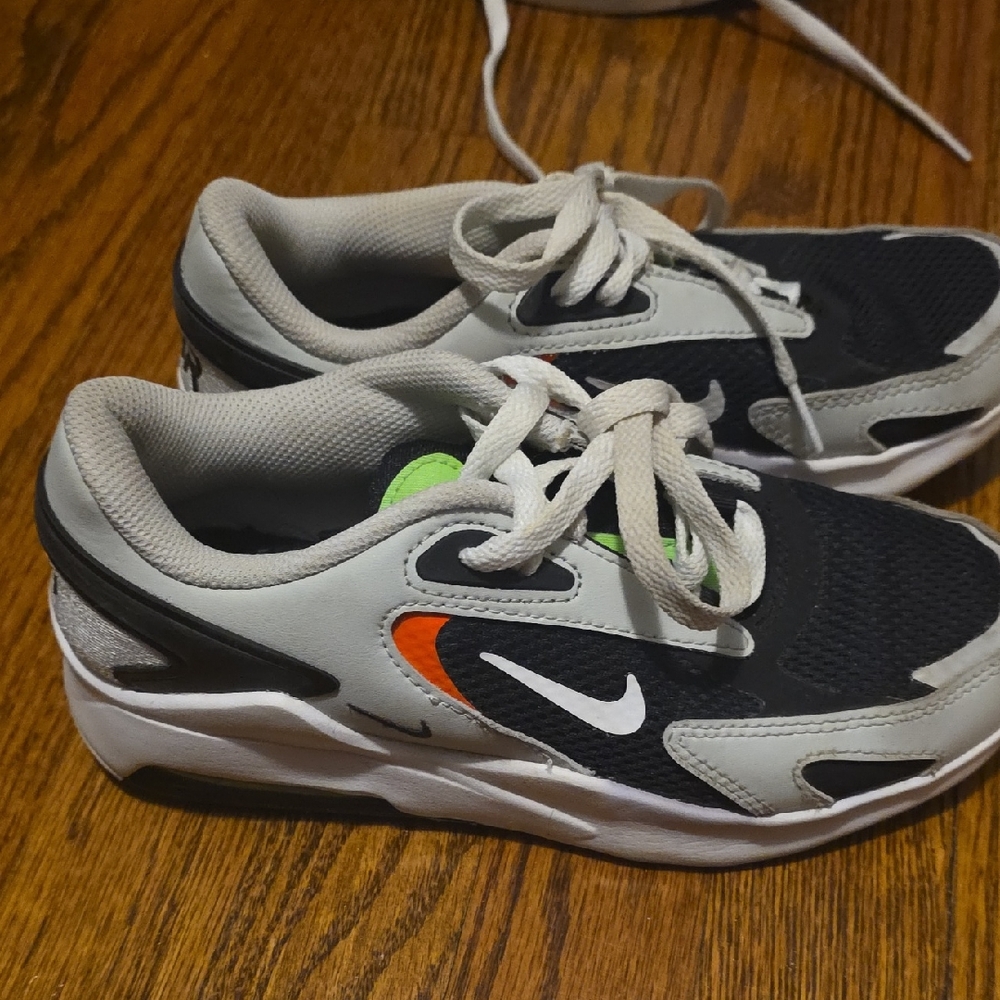 Nike AirMax Kids Black, White, and Orange Sneakers